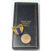 US3445.)CASED WWII SELECTIVE SERVICE MEDAL AND AWARD DOCUMENT
