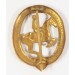 G567.)CASED EQUESTRIAN BADGE IN GOLD