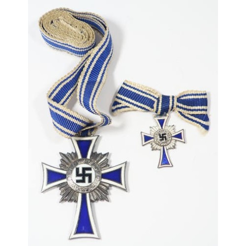 G648.)MOTHER'S CROSS IN SILVER WITH MINIATURE