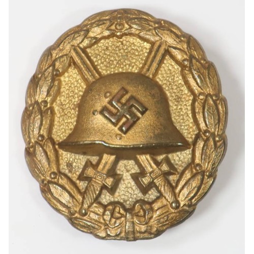 G540.)1936 SPANISH-TYPE WOUND BADGE IN GOLD