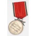 G774.)CASED EAGLE ORDER SERVICE MEDAL IN SILVER WITH SWORDS