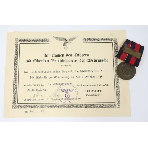 G909.)1938 CZECH OCCUPATION MEDAL AND AWARD DOCUMENT