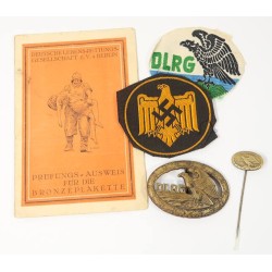 G1050.)1930'S GERMAN LIFE-SAVING BADGE AND ACCOMPANYING PIECES, DOCUMENT